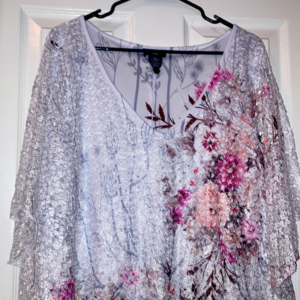 Laced laid over a sleeveless shirt